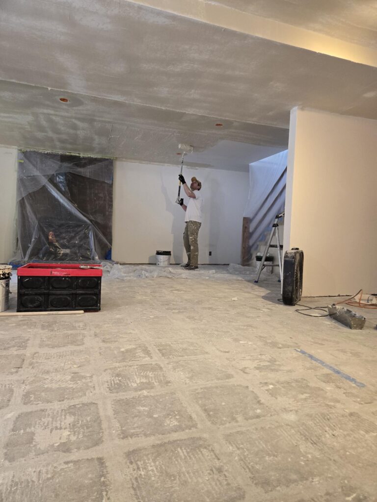 Professional skim coating for a Level 5 drywall finish in a Utah home.
