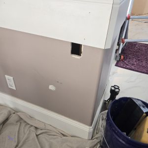 Professional drywall hole repair and patching on a master bathroom in Bountiful, Utah.